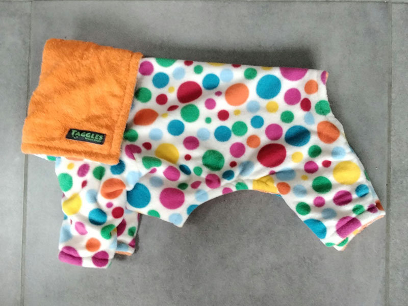 White spots with orange towel drying onesie